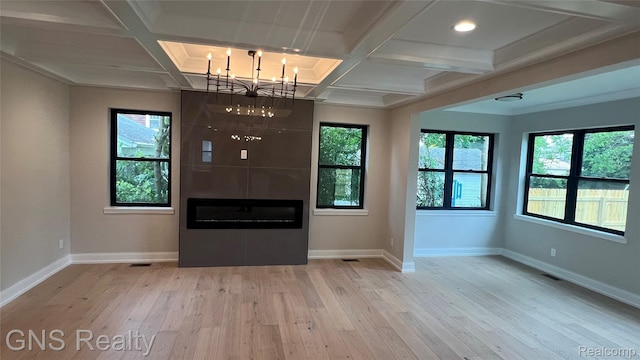 206 E Windemere Ave, Royal Oak, MI 48073 - unfurnished living room featuring wood-type flooring, a chandelier, coffered ceiling, plenty of natural light, and beam ceiling