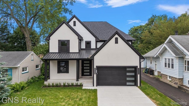 206 E Windemere Ave, Royal Oak, MI 48073 - view of front of home with covered porch, stucco siding, driveway, a front lawn, and an attached garage