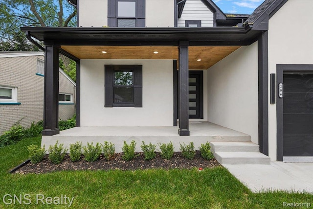 206 E Windemere Ave, Royal Oak, MI 48073 - property entrance featuring stucco siding and a porch