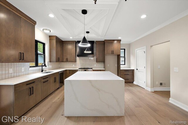 206 E Windemere Ave, Royal Oak, MI 48073 - kitchen featuring wall chimney exhaust hood, backsplash, light wood-style flooring, plenty of natural light, and coffered ceiling