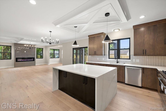 206 E Windemere Ave, Royal Oak, MI 48073 - kitchen with dishwasher, coffered ceiling, a chandelier, tasteful backsplash, and a center island
