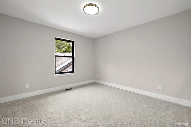 206 E Windemere Ave, Royal Oak, MI 48073 - unfurnished room featuring baseboards and carpet floors