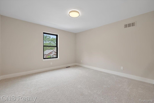 206 E Windemere Ave, Royal Oak, MI 48073 - carpeted empty room featuring baseboards