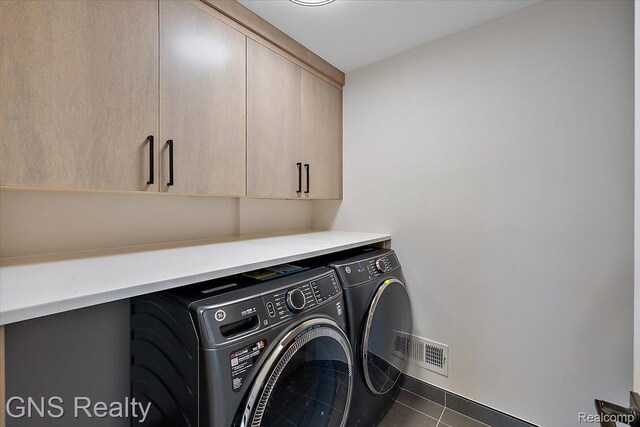 206 E Windemere Ave, Royal Oak, MI 48073 - washroom with cabinet space, washing machine and clothes dryer, and tile patterned flooring