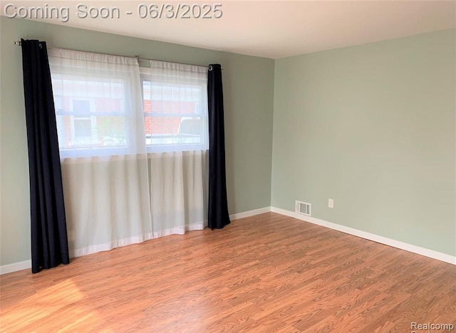 28132 Brentwood St, Southfield, MI 48076 - spare room featuring wood finished floors and baseboards