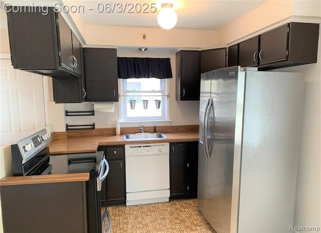 28132 Brentwood St, Southfield, MI 48076 - kitchen with stainless steel appliances, a sink, and light countertops