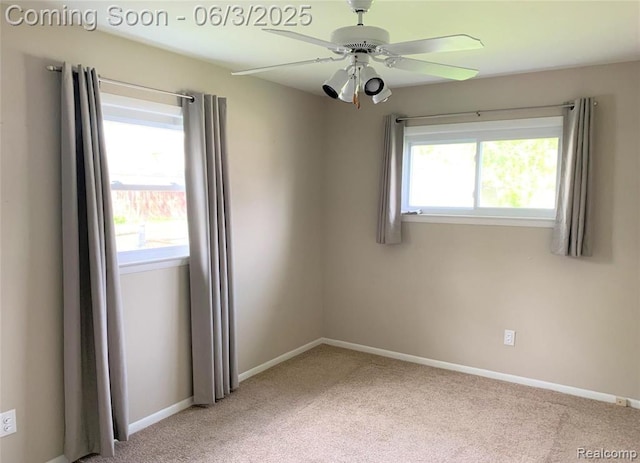28132 Brentwood St, Southfield, MI 48076 - spare room featuring light carpet, plenty of natural light, baseboards, and a ceiling fan