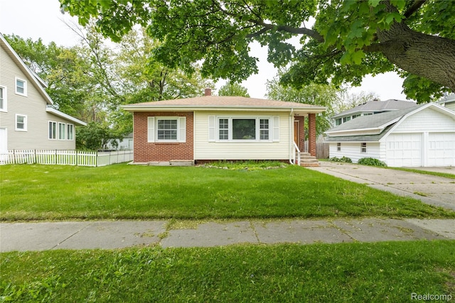 2028 9th St, Port Huron, MI 48060 - view of front facade with a chimney, brick siding, and entry steps