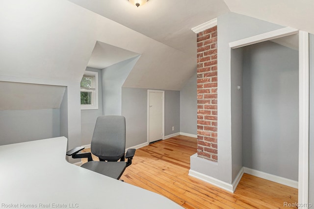 30 Charlevoix St, Clawson, MI 48017 - bedroom featuring wood-type flooring, vaulted ceiling, baseboards, and an office area