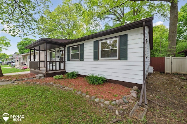 3825 Craig Dr, Flint, MI 48506 - view of front of home featuring covered porch