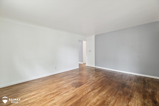 3825 Craig Dr, Flint, MI 48506 - empty room with wood finished floors and baseboards