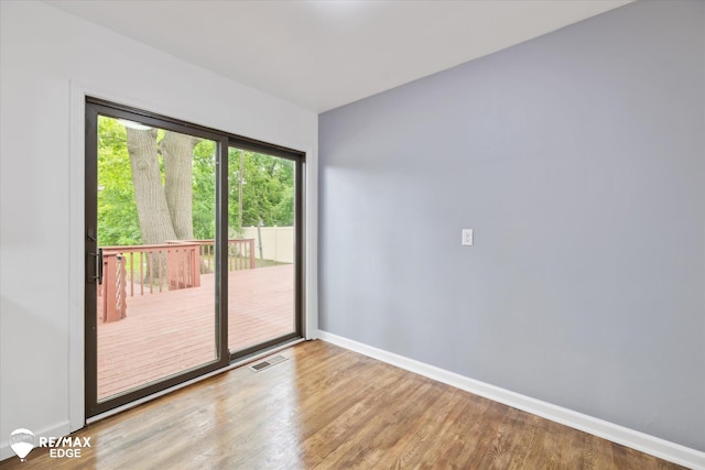 3825 Craig Dr, Flint, MI 48506 - unfurnished room with baseboards and wood finished floors