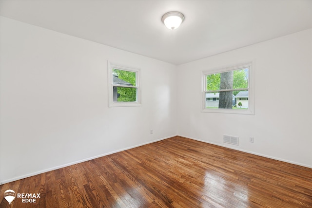 3825 Craig Dr, Flint, MI 48506 - empty room featuring wood finished floors and baseboards