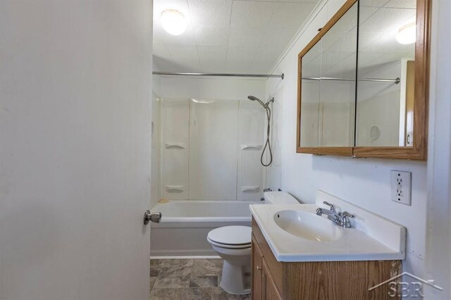 1303 S Warner St, Bay City, MI 48706 - bathroom with toilet, vanity, and tub / shower combination