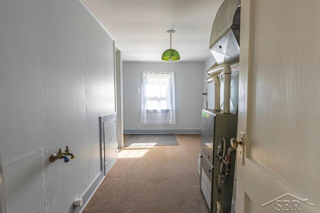1303 S Warner St, Bay City, MI 48706 - hallway featuring carpet flooring and baseboards
