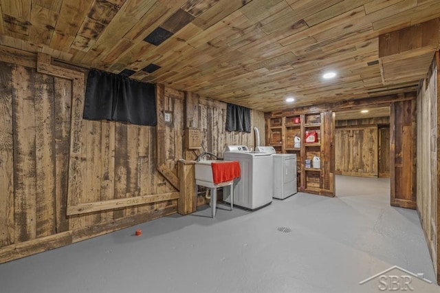 705 W Jenny St, Bay City, MI 48706 - finished below grade area with washing machine and clothes dryer, wood ceiling, wood walls, and a sink