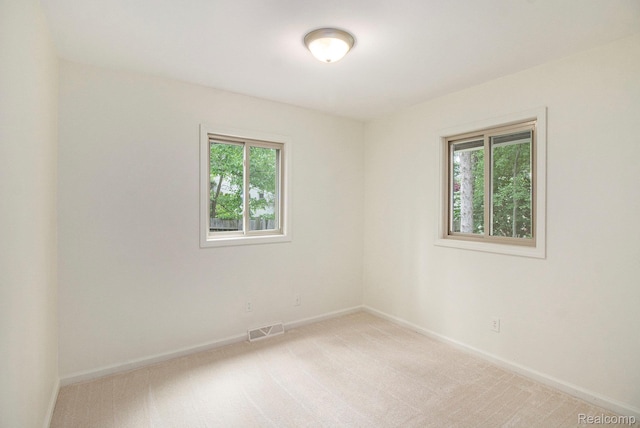 7831 Caberfae Trl, Clarkston, MI 48348 - empty room with plenty of natural light and light carpet