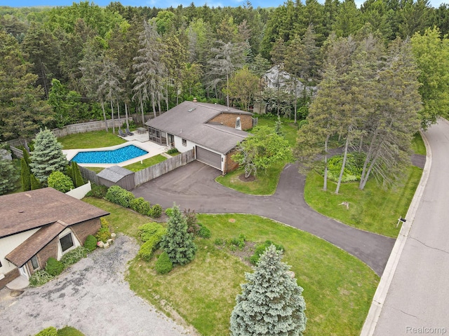 7831 Caberfae Trl, Clarkston, MI 48348 - bird's eye view of a forest and a pool area
