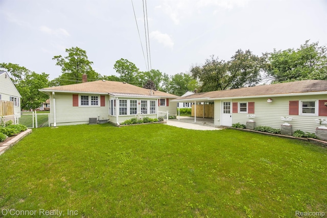 3333 Stone, Port Huron, MI 48060 - back of property with a patio, cooling unit, a carport, and a chimney