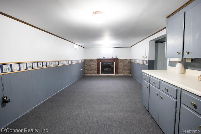 3333 Stone, Port Huron, MI 48060 - basement featuring wainscoting, a fireplace with raised hearth, and carpet flooring