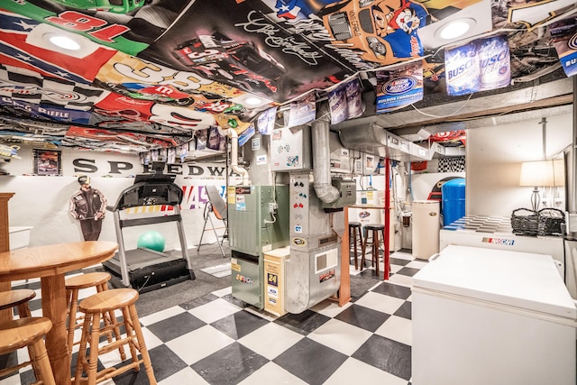 8595 E Napier Ave, Benton Harbor, MI 49022 - below grade area with tile patterned floors and heating unit