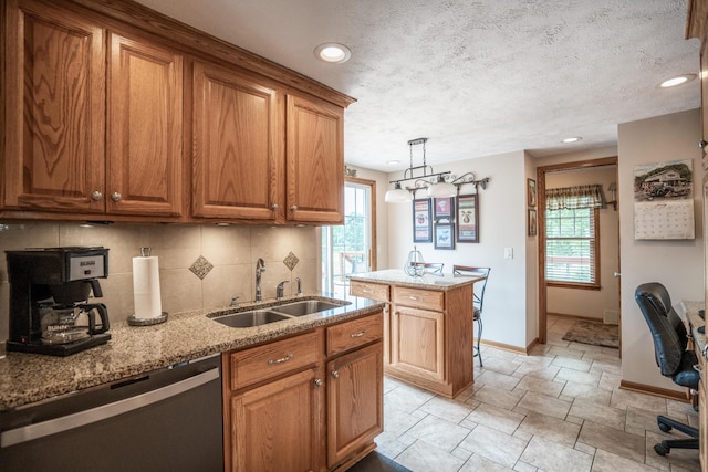 8595 E Napier Ave, Benton Harbor, MI 49022 - kitchen featuring dishwasher, a sink, tasteful backsplash, healthy amount of natural light, and recessed lighting