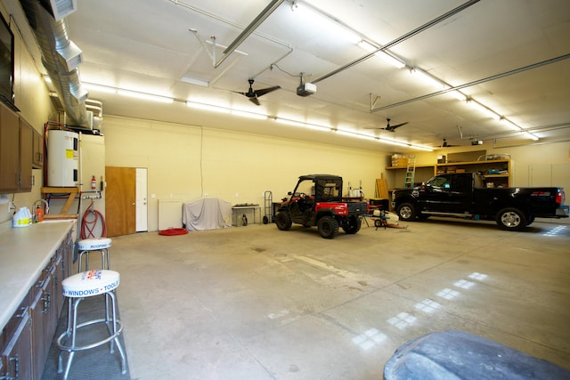 8595 E Napier Ave, Benton Harbor, MI 49022 - garage with a garage door opener and water heater