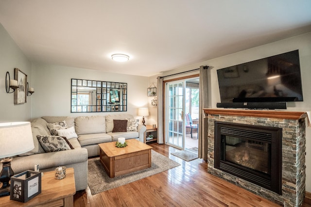 8595 E Napier Ave, Benton Harbor, MI 49022 - living room with wood finished floors and a fireplace