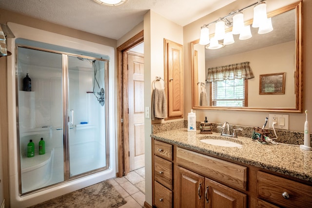 8595 E Napier Ave, Benton Harbor, MI 49022 - bathroom with a shower stall, vanity, tile patterned flooring, and a textured ceiling
