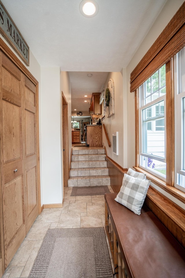 8595 E Napier Ave, Benton Harbor, MI 49022 - entryway featuring stone tile flooring, stairway, baseboards, and recessed lighting
