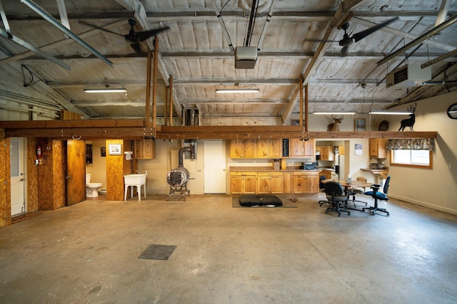8595 E Napier Ave, Benton Harbor, MI 49022 - garage with a sink and a garage door opener