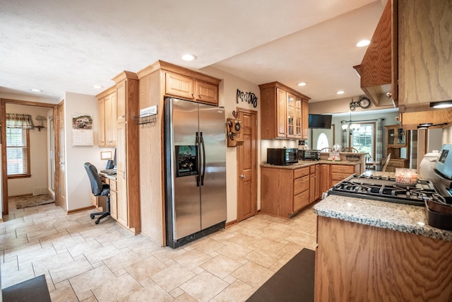 8595 E Napier Ave, Benton Harbor, MI 49022 - kitchen with stainless steel refrigerator with ice dispenser, stone tile flooring, black microwave, recessed lighting, and glass insert cabinets