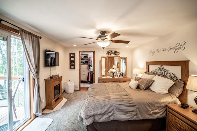 8595 E Napier Ave, Benton Harbor, MI 49022 - bedroom with light carpet, a walk in closet, a ceiling fan, recessed lighting, and a closet