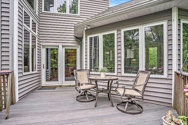 8837 56th Ave, Hudsonville, MI 49426 - wooden deck with outdoor dining area