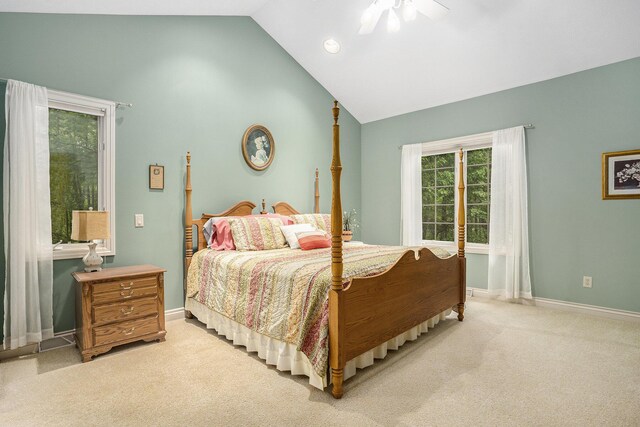 8837 56th Ave, Hudsonville, MI 49426 - bedroom with vaulted ceiling, light carpet, baseboards, and ceiling fan