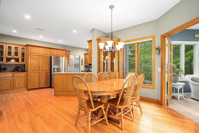 8837 56th Ave, Hudsonville, MI 49426 - dining space with a chandelier, light wood-type flooring, and recessed lighting