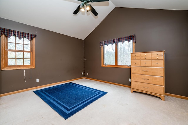 4569 Terra Ln, Saint Joseph, MI 49085 - unfurnished bedroom with light colored carpet, multiple windows, and vaulted ceiling