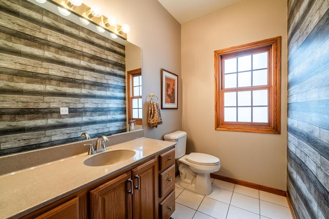 4569 Terra Ln, Saint Joseph, MI 49085 - bathroom with wooden walls, vanity, and tile patterned floors