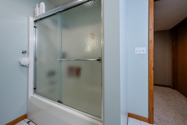 4569 Terra Ln, Saint Joseph, MI 49085 - bathroom with baseboards and enclosed tub / shower combo