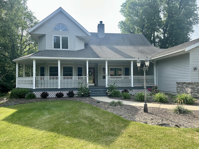 4569 Terra Ln, Saint Joseph, MI 49085 - country-style home with a chimney, a front yard, a porch, and roof with shingles