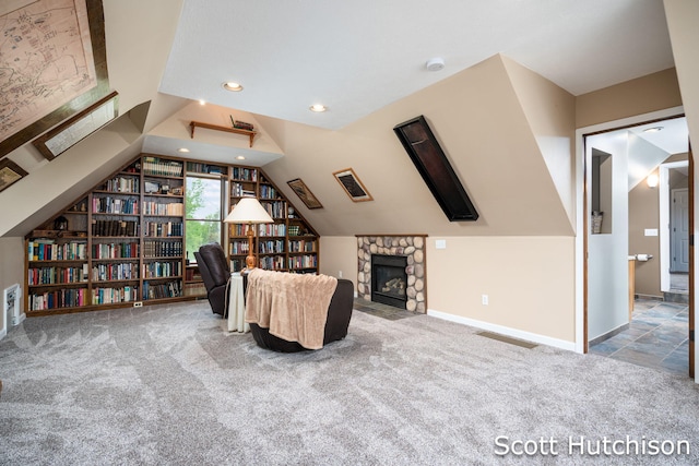 9953 10 Mile Rd NE, Rockford, MI 49341 - living room with carpet flooring, recessed lighting, a fireplace, vaulted ceiling, and baseboards