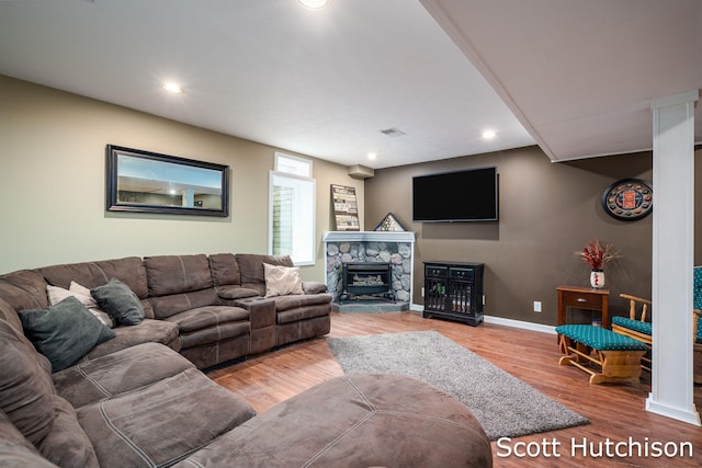 9953 10 Mile Rd NE, Rockford, MI 49341 - living room with wood finished floors, baseboards, and recessed lighting