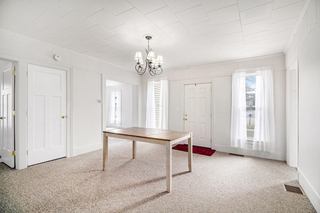 501 E Paw Paw St, Paw Paw, MI 49079 - unfurnished office with crown molding, carpet floors, a chandelier, and baseboards