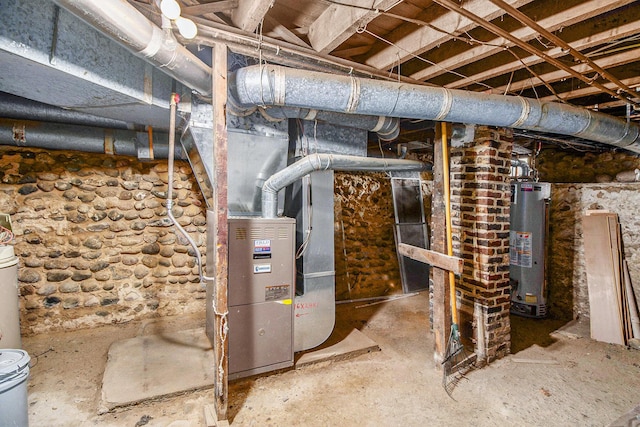 501 E Paw Paw St, Paw Paw, MI 49079 - utility room featuring water heater