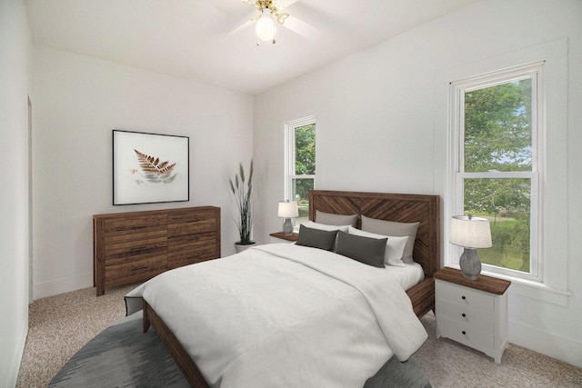 501 E Paw Paw St, Paw Paw, MI 49079 - bedroom with carpet floors, baseboards, and ceiling fan