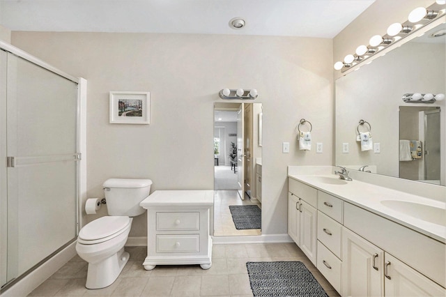 159 Water Lily Way NE, Comstock Park, MI 49321 - bathroom featuring double vanity, tile patterned floors, baseboards, and toilet