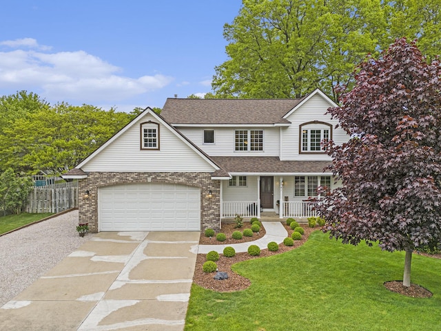 2481 Jameswood Ct, Holland, MI 49424 - traditional home featuring covered porch, concrete driveway, roof with shingles, and brick siding