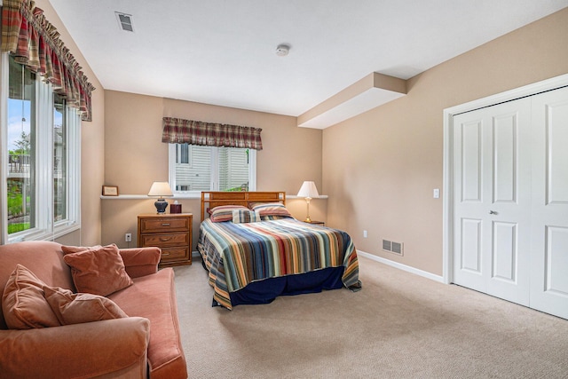 2176 Teal Ct SE, Grand Rapids, MI 49546 - bedroom featuring carpet floors, baseboards, and a closet