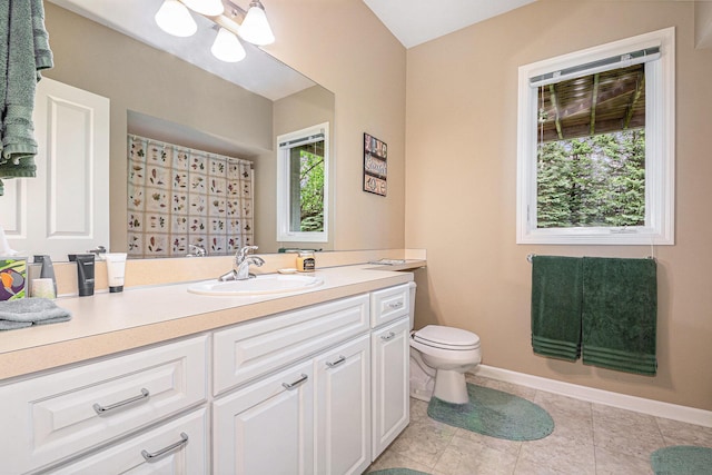 2176 Teal Ct SE, Grand Rapids, MI 49546 - bathroom featuring vanity, toilet, tile patterned flooring, a chandelier, and baseboards