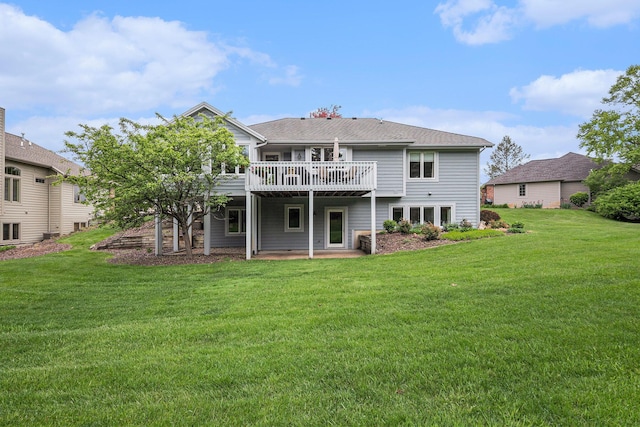 2176 Teal Ct SE, Grand Rapids, MI 49546 - rear view of house with a lawn, a wooden deck, and a patio